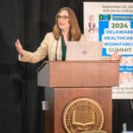 Senator Sarah McBride at the podium during the 2024 Delaware Healthcare Workforce Summit.